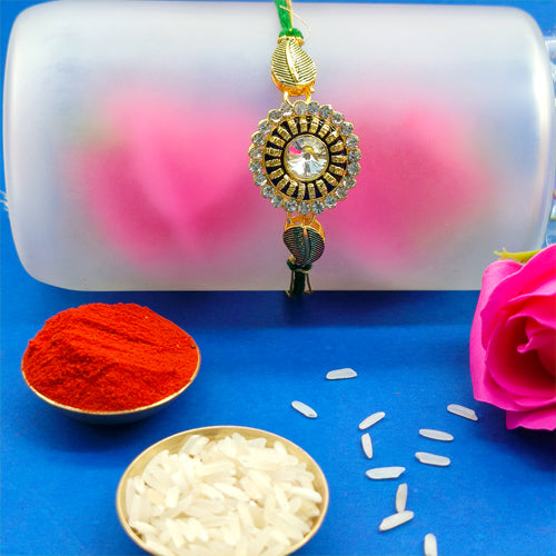 floral shape rakhi with Green and white Stone