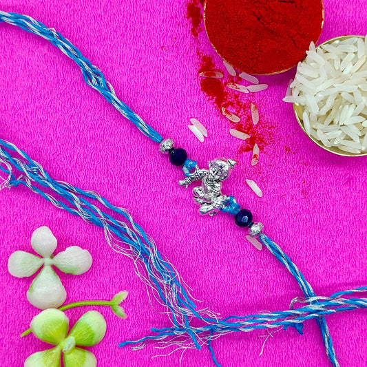 Kanha Idol Rakhi with blue and silver threads