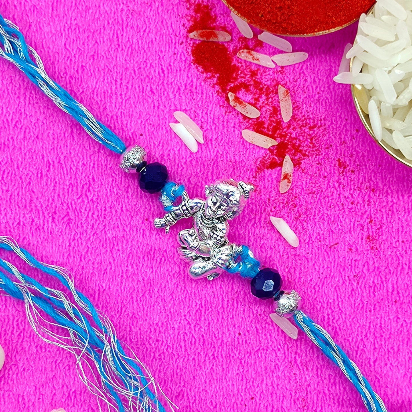 Kanha Idol Rakhi with blue and silver threads