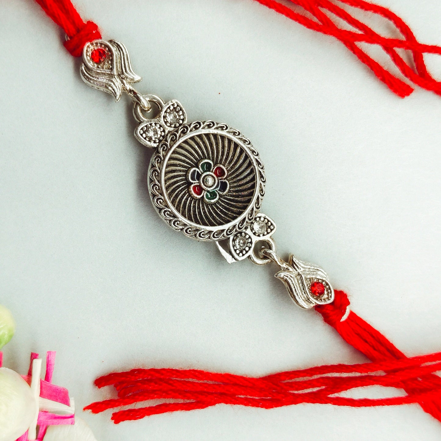 Silver flower Rakhi